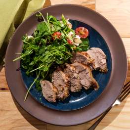 Jerk Crusted Pork Chops with Spinach Salad