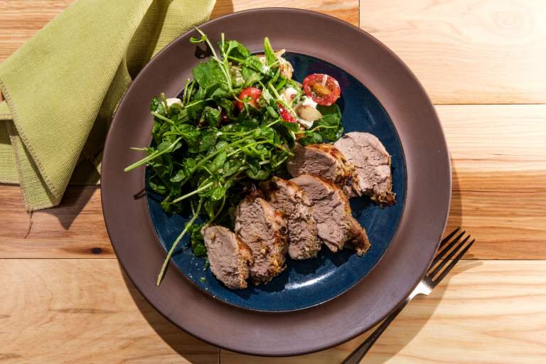 Jerk Crusted Pork Chops with Spinach Salad