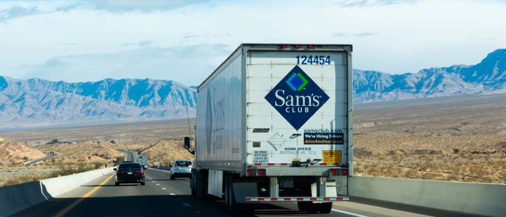 Sam's Club truck driving on the highway with other cars